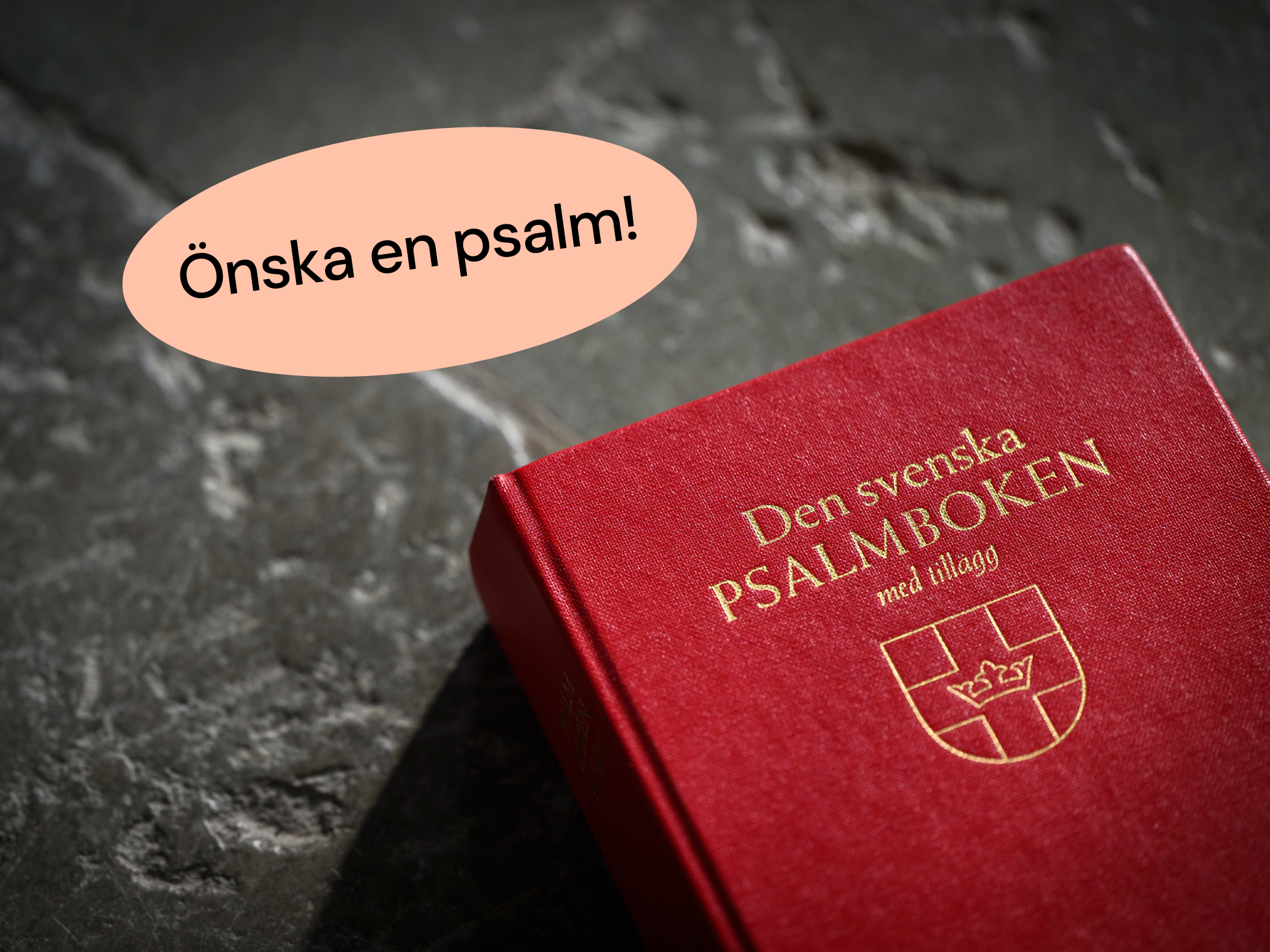 Psalmbok med texten "Önska en psalm" bredvid.