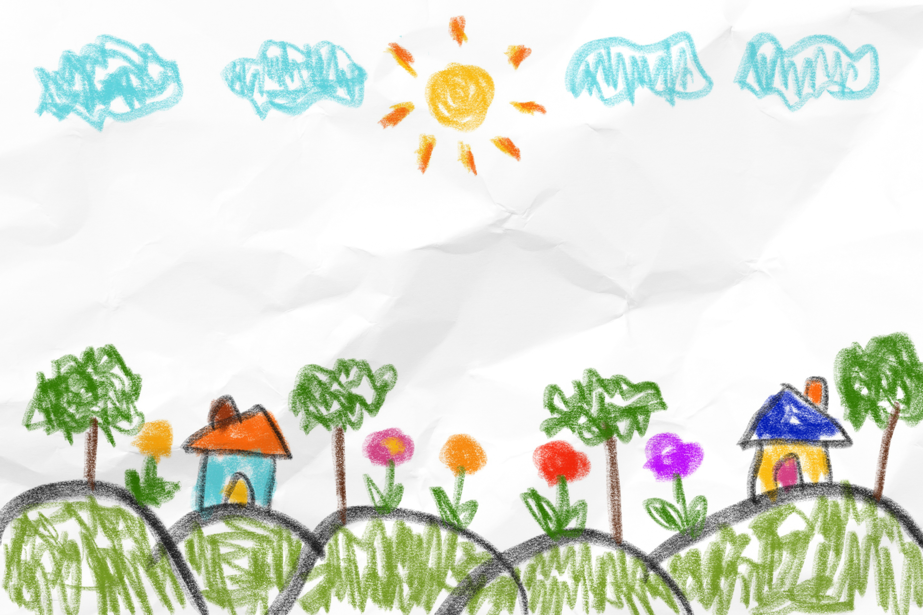 Teckning gjord av barn på en äng och sol